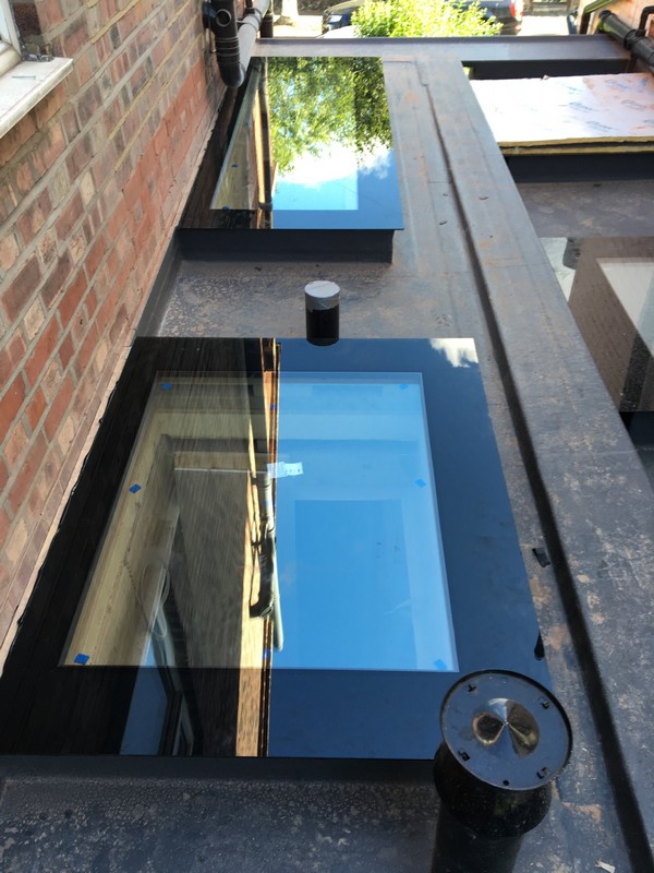 Multiple flat roof skylights on extension in Richmond